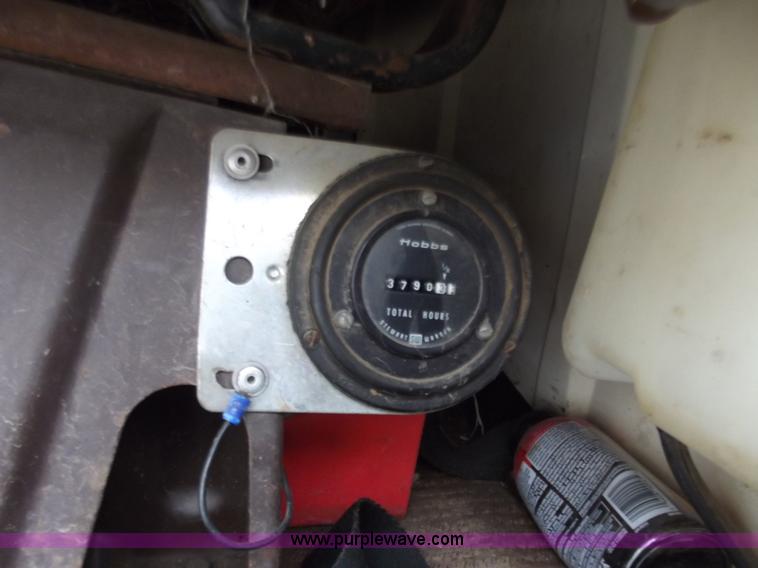 image for item D3504 1979 Ford flatbed truck with crane