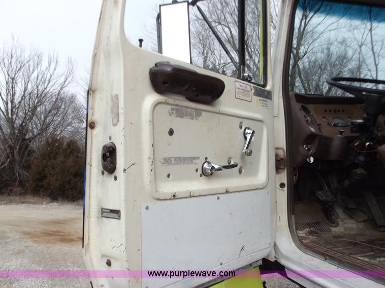 image for item D3504 1979 Ford flatbed truck with crane