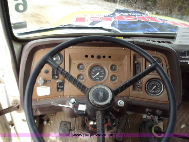 image for item D3504 1979 Ford flatbed truck with crane