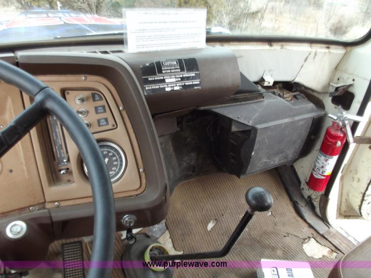 image for item D3504 1979 Ford flatbed truck with crane