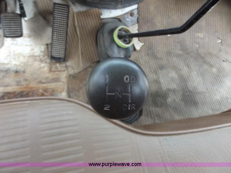 image for item D3504 1979 Ford flatbed truck with crane