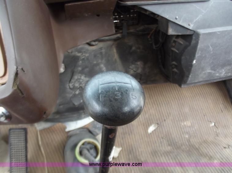 image for item D3504 1979 Ford flatbed truck with crane