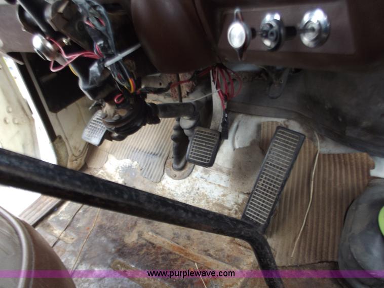 image for item D3504 1979 Ford flatbed truck with crane