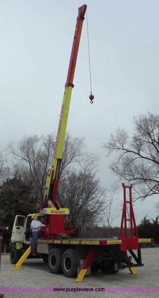 image for item D3504 1979 Ford flatbed truck with crane