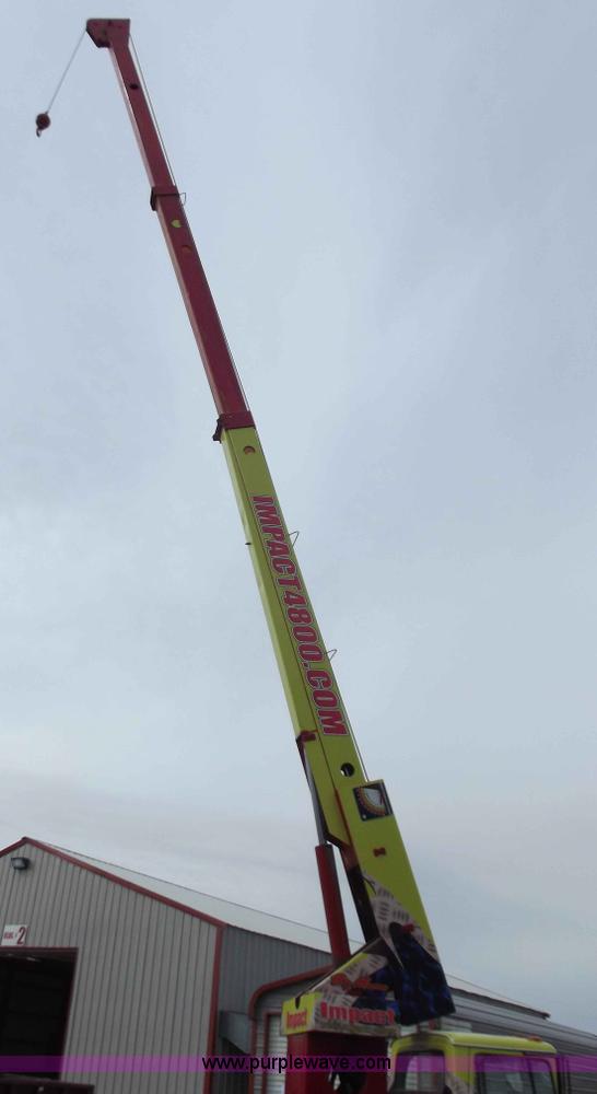 image for item D3504 1979 Ford flatbed truck with crane