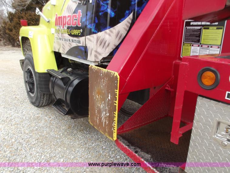 image for item D3504 1979 Ford flatbed truck with crane