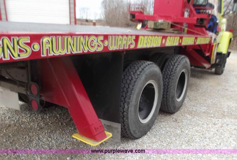 image for item D3504 1979 Ford flatbed truck with crane