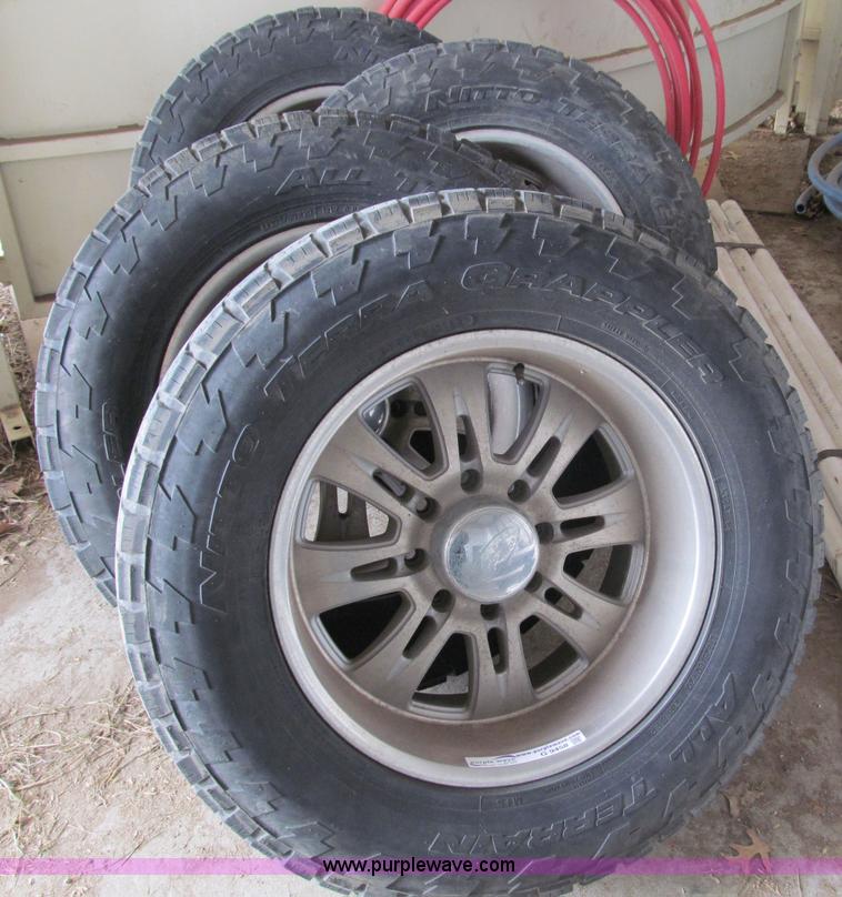 image for item G9458 (4) LT325/60R20 tires and wheels