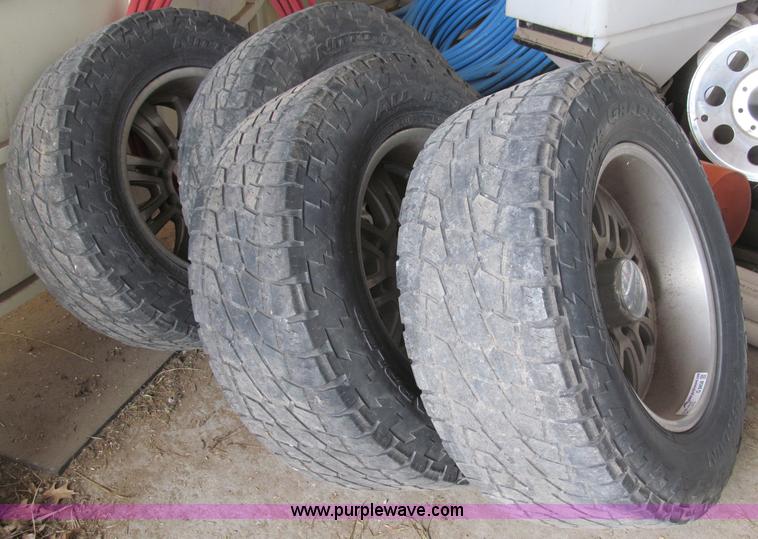 image for item G9458 (4) LT325/60R20 tires and wheels