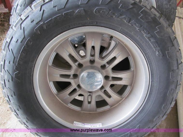 image for item G9458 (4) LT325/60R20 tires and wheels