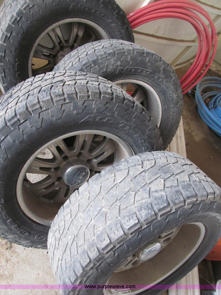 image for item G9458 (4) LT325/60R20 tires and wheels