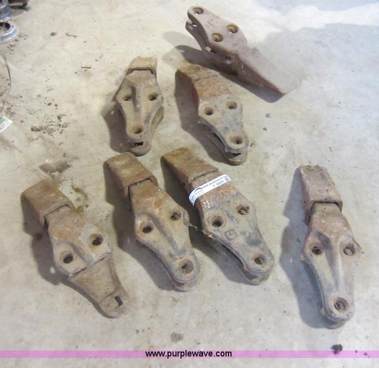 image for item V9005 (6) Caterpillar 966 track loader shanks and teeth
