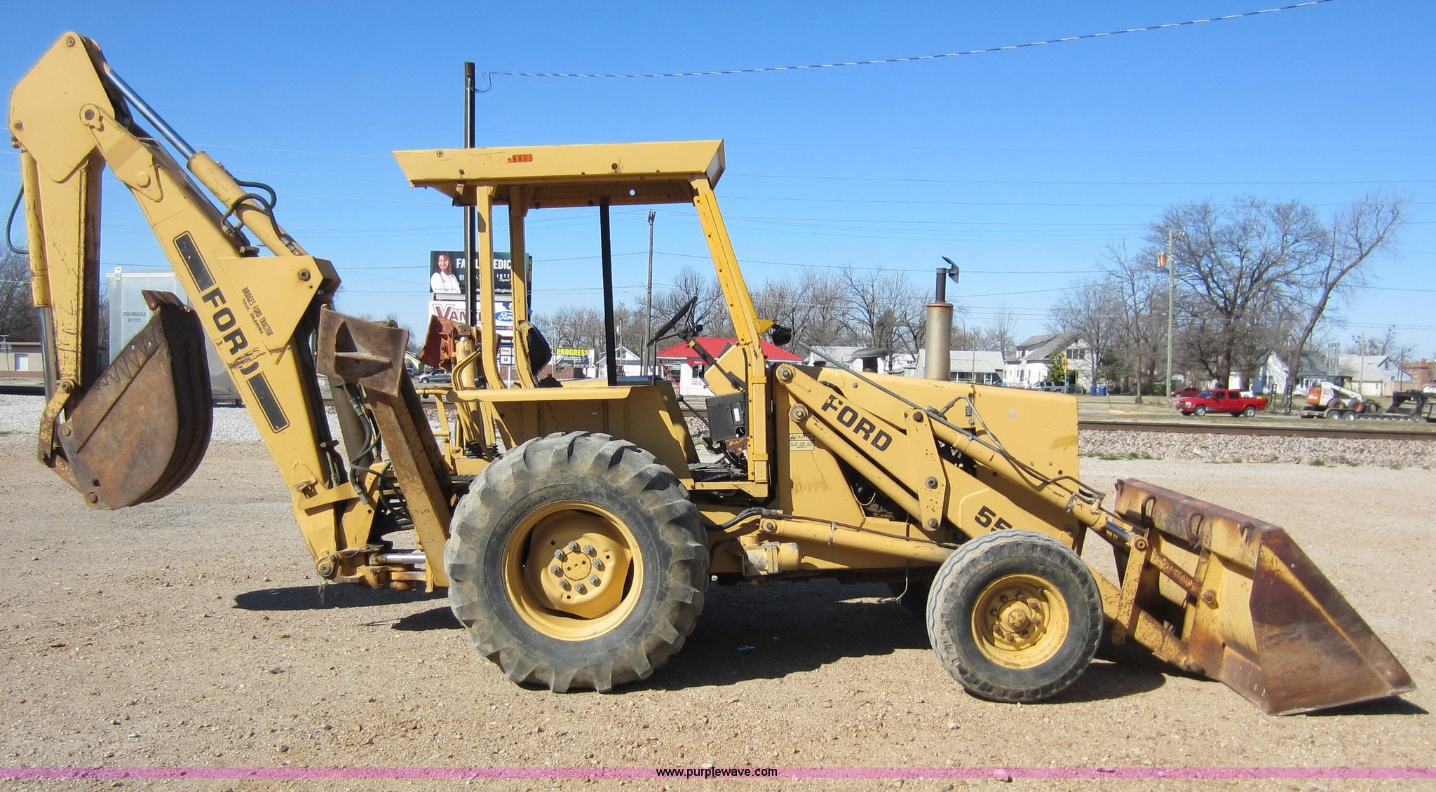 Ford 555 backhoe in Miami, OK Item C5338 sold Purple Wave
