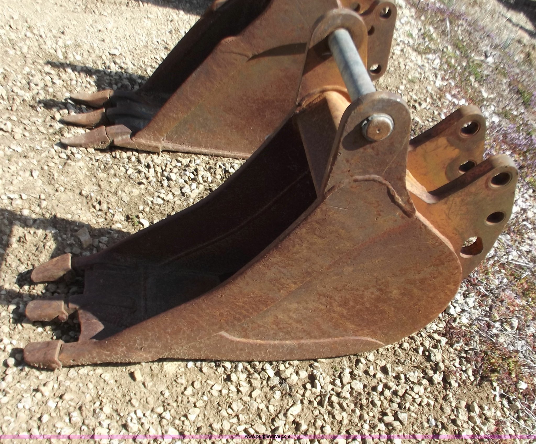 Woods 12" backhoe bucket with three teeth in Jefferson City, MO Item