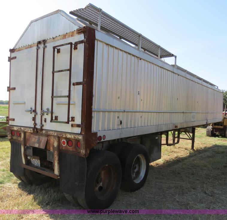 image for item B2337 1977 Kraus 42' aluminum bulk feed trailer
