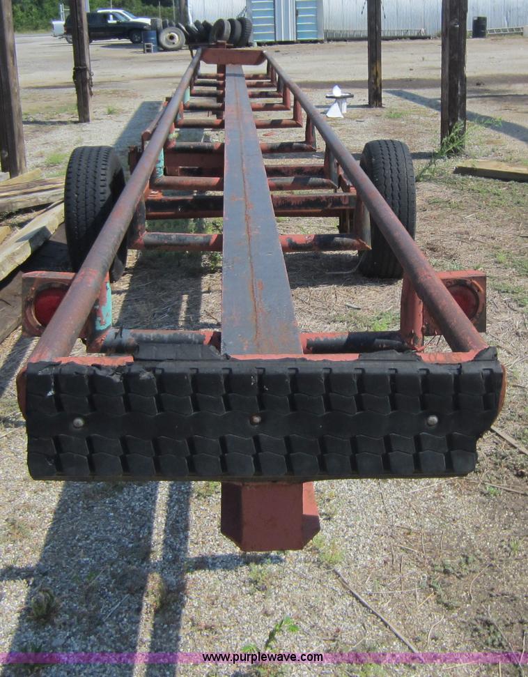 image for item D2044 32' round bale trailer