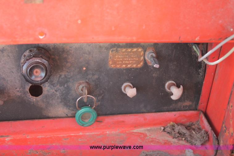 image for item L9896 Case 1155 self-propelled swather