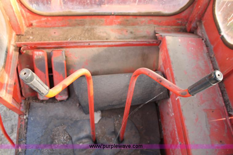 image for item L9896 Case 1155 self-propelled swather