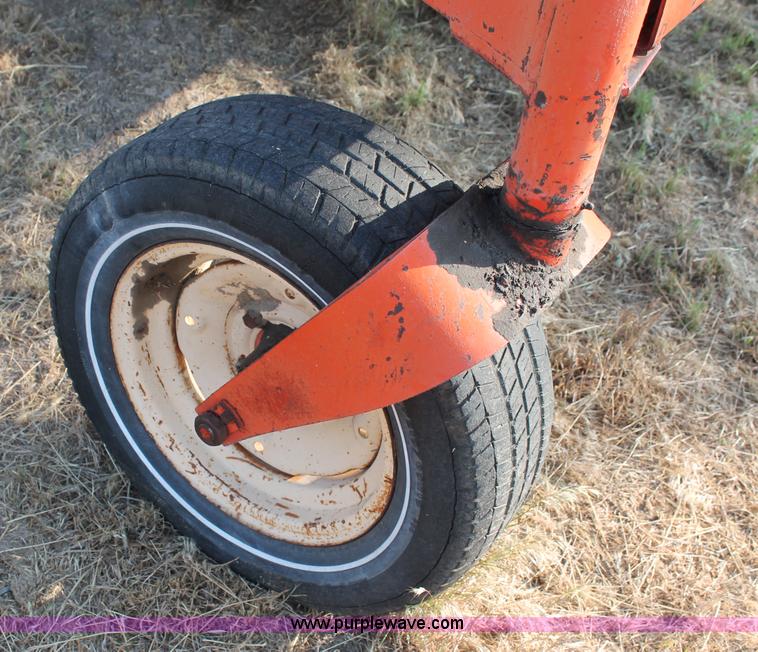 image for item L9896 Case 1155 self-propelled swather