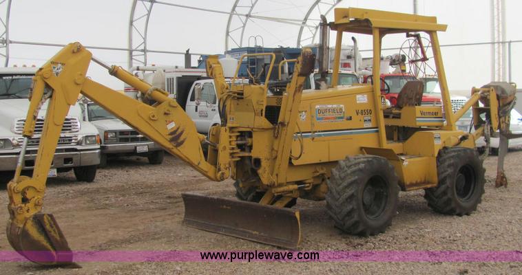 C3064.JPG - 1995 Vermeer V8550 backhoe/vibrating plow , 1,446 hours on meter , Cummins 3 9L four cylinder diesel...