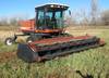 Hesston 8450 swather 1,908 hours on meter 1,464 hours on separator Cummins four cylinder diesel engi...