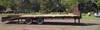 Thumbnail T_B1613AAAA.JPG of 2000 Mongoose 25 gooseneck trailer , 20 flatbed , 5 dovetail , 102 quot W , 2 sliding fold over ramp...