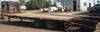 Thumbnail T_B1613AAAAAA.JPG of 2000 Mongoose 25 gooseneck trailer , 20 flatbed , 5 dovetail , 102 quot W , 2 sliding fold over ramp...