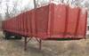 1969 Fruehauf tandem axle flatbed trailer 46 8 L x 90 W 4 H side boards Stake pockets Steel lined pl...