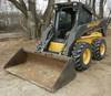 New Holland LS180 skid steer 690 hours on meter Enclosed cab Heat Hand and foot controls Dual front ...