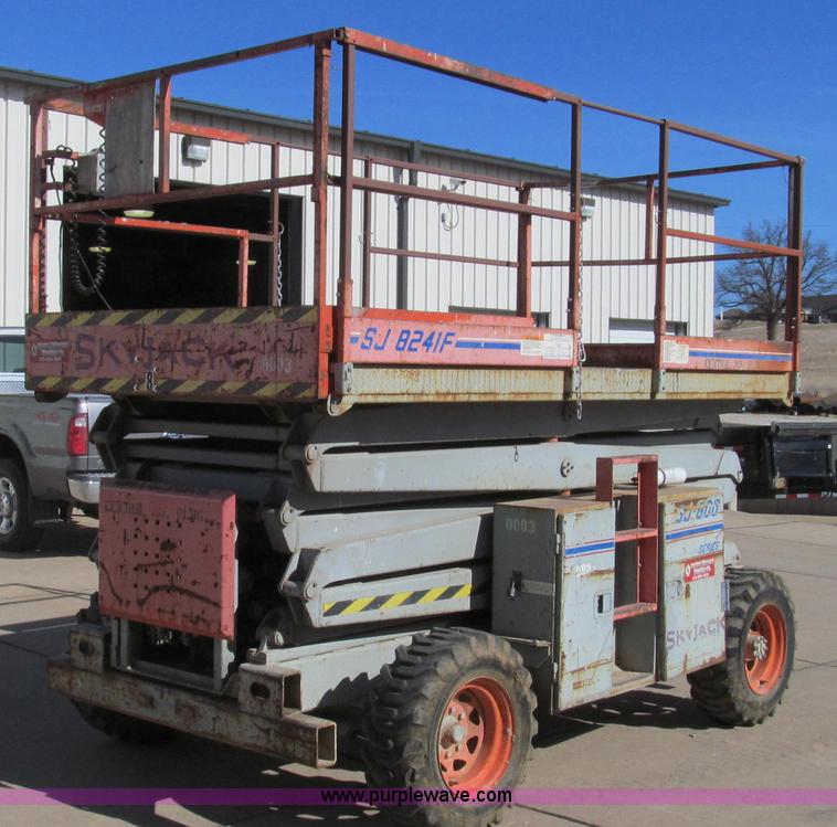 E3734.JPG - Skyjack SJ8241F scissor lift , 3,014 hours on meter , Kubota three cylinder gas or LP engine , 41 ma...