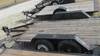 Thumbnail T_E3710A.JPG of 1977 Shop built tandem axle trailer , 11L x 6W , Wood deck , Light kit , Pintle hitch , 205/75R14 ti...
