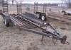 Thumbnail T_F4283D.JPG of 1977 13 tandem axle trailer , 75 quot W , 52 quot L x 18 quot W ramps , Pintle hitch , Safety break ...