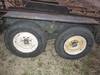 Thumbnail T_F4283K.JPG of 1977 13 tandem axle trailer , 75 quot W , 52 quot L x 18 quot W ramps , Pintle hitch , Safety break ...