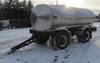 Thumbnail T_F5911D.JPG of Portable water tank trailer , Tandem axle , Gravity feed , Air brakes , Pintle hitch , 10 20 tires 9...