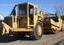 Graders and scrapers