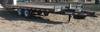 2009 PJ T8222 tilt deck tandem axle trailer 22 L x 8 W deck Wood deck with steel grating Stake rails...