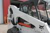 Thumbnail T_E2860ZF.JPG of 2009 Bobcat S300 skid steer , 1,218 hours on meter , Kubota four cylinder diesel engine , Model V380...