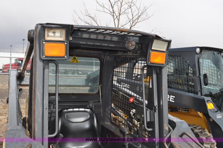 image for item C3482 2003 New Holland LS180 skid steer