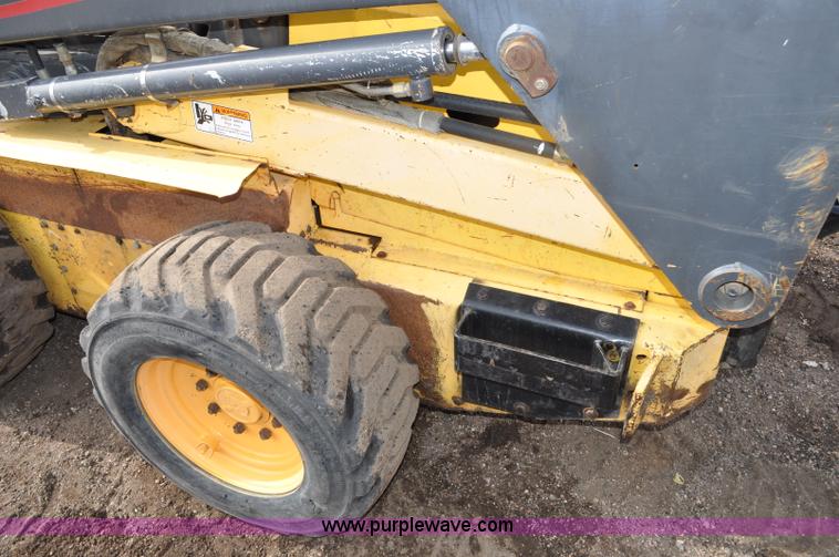 image for item C3482 2003 New Holland LS180 skid steer