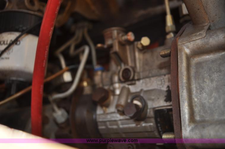 image for item C3482 2003 New Holland LS180 skid steer