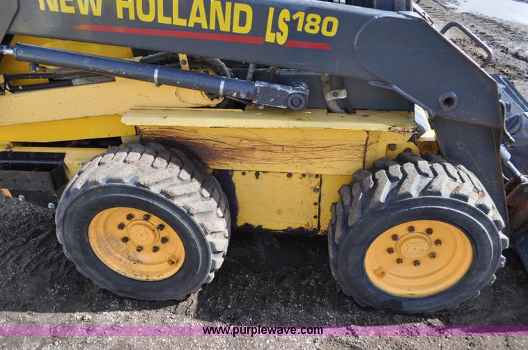 image for item C3482 2003 New Holland LS180 skid steer