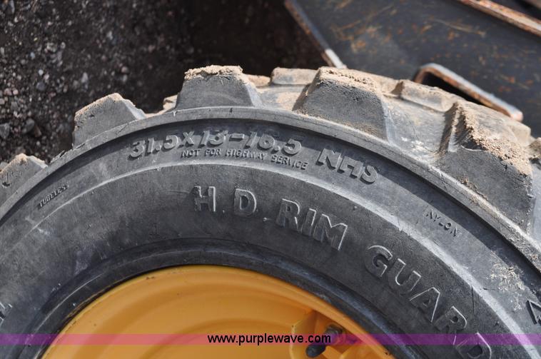 image for item C3482 2003 New Holland LS180 skid steer