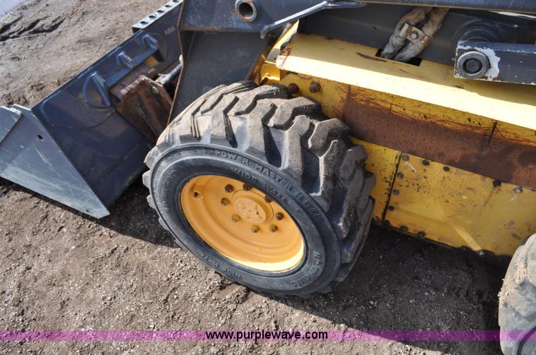 image for item C3482 2003 New Holland LS180 skid steer