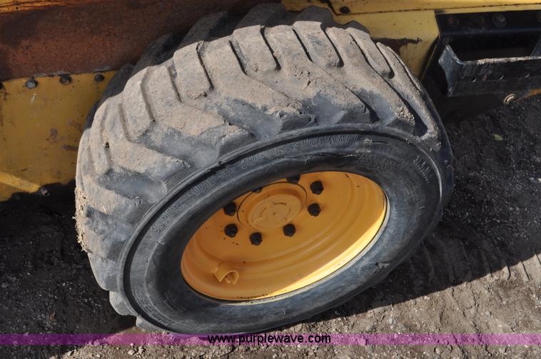 image for item C3482 2003 New Holland LS180 skid steer