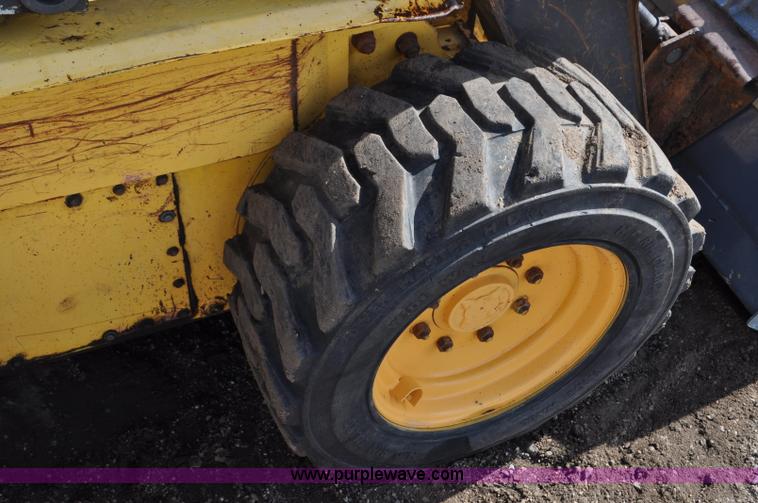 image for item C3482 2003 New Holland LS180 skid steer