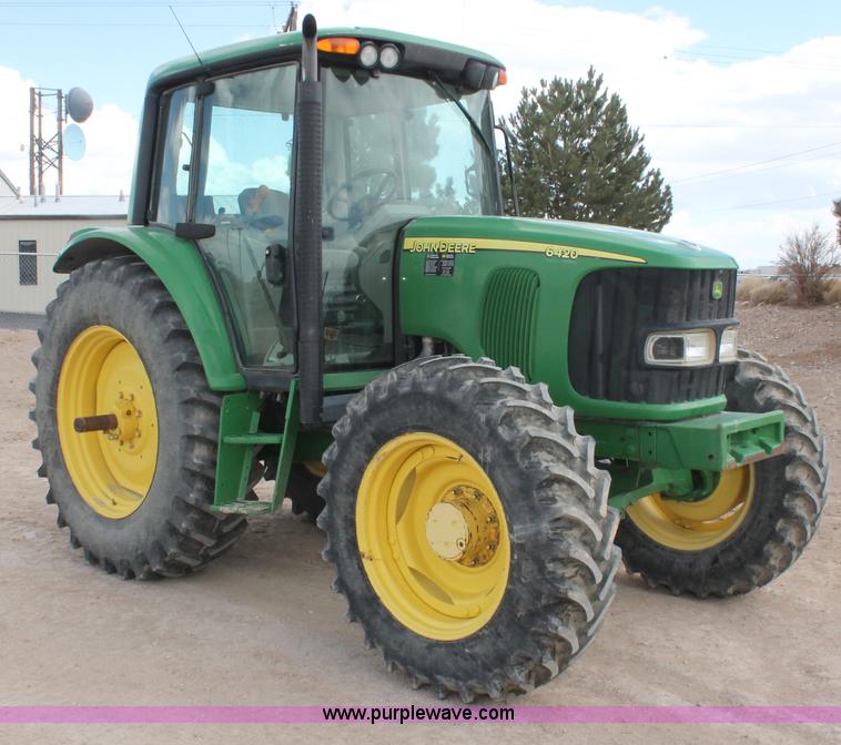 image for item E3256 2002 John Deere 6420 MFWD tractor