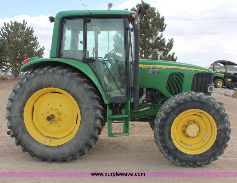 image for item E3256 2002 John Deere 6420 MFWD tractor
