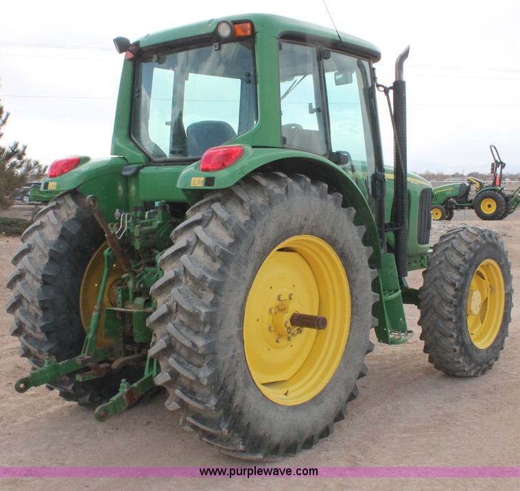 image for item E3256 2002 John Deere 6420 MFWD tractor