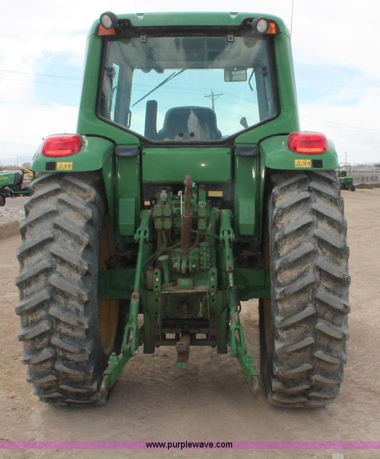 image for item E3256 2002 John Deere 6420 MFWD tractor