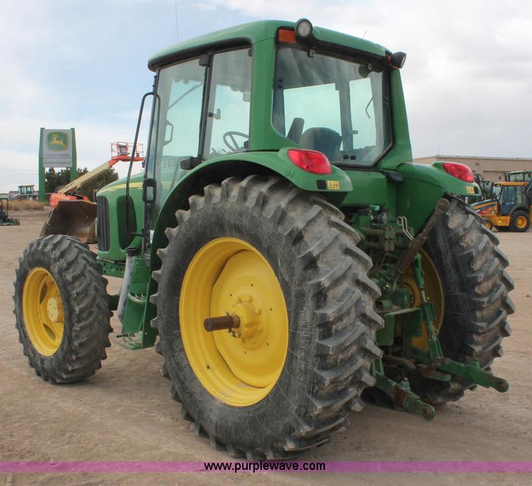 image for item E3256 2002 John Deere 6420 MFWD tractor